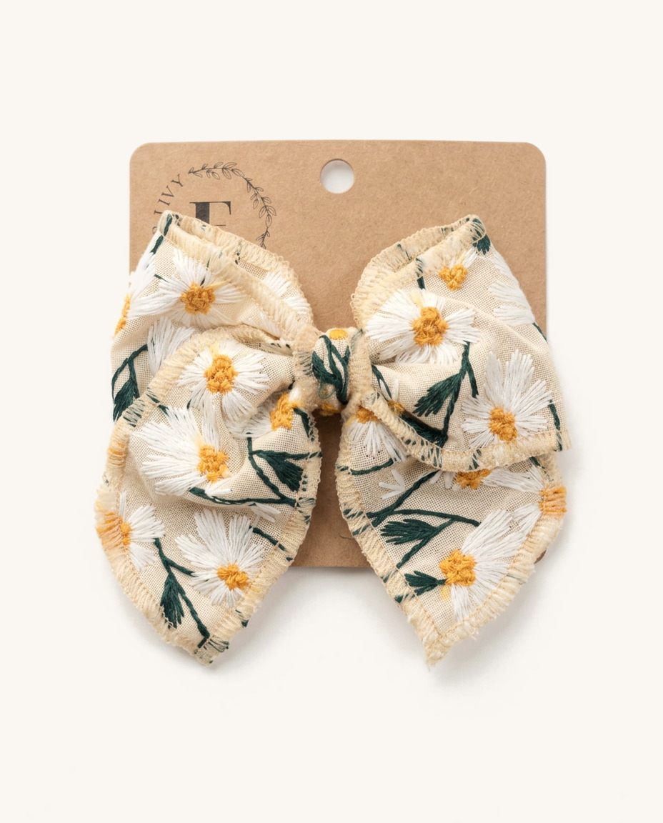 Daisy Embroidered Linen Bow — on the Elle & Ivy packaging card